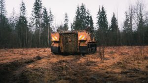 Rear view of an armored tank in a forest clearing