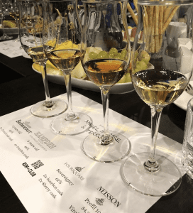 Rum tasting placemat with four different glasses of rum