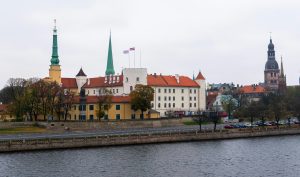 Riga Castle and church spires viewed from across the river